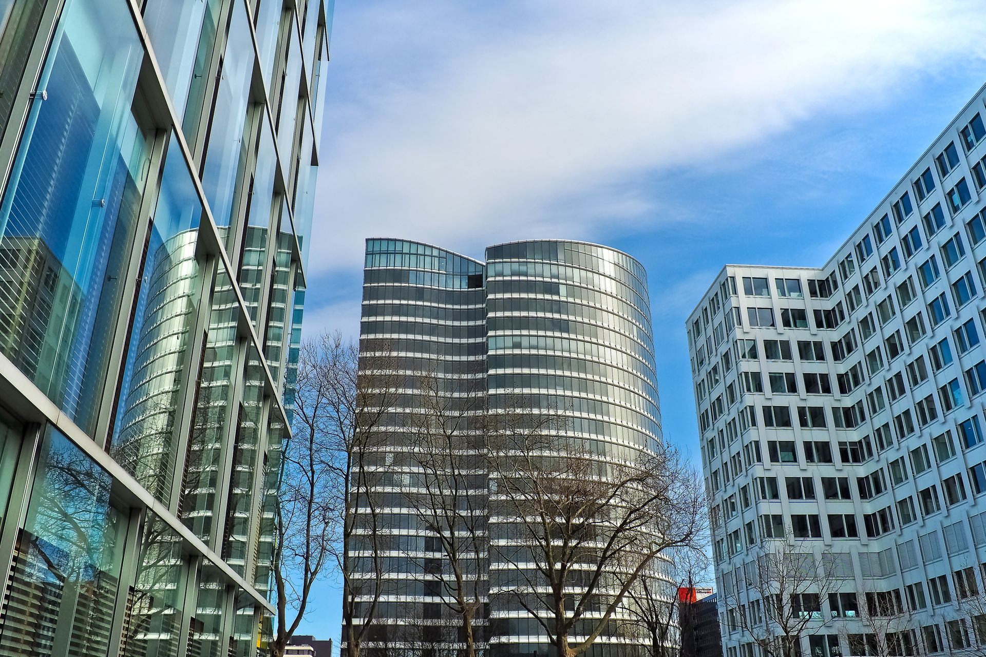Modern commercial skyscrapers against a clear blue sky