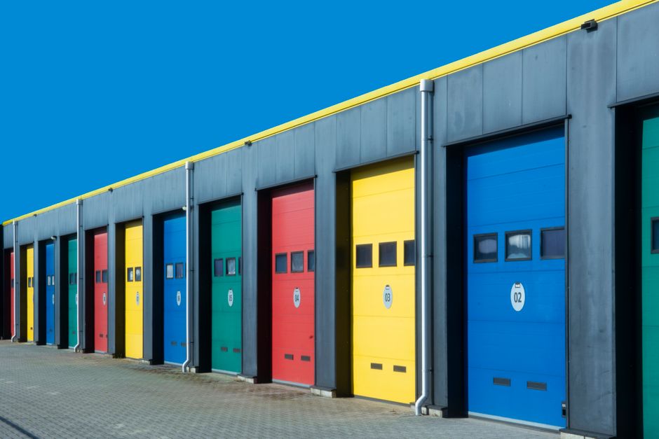 Row of industrial garage doors in a self-storage facility