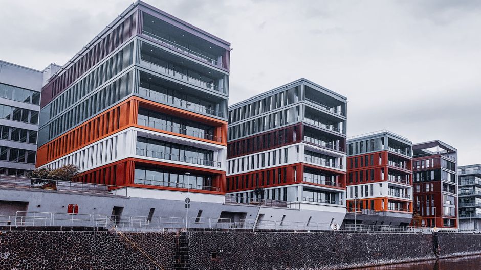 Contemporary waterfront apartment buildings showcasing modern architecture